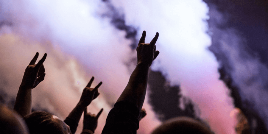 hands in air at punk rock concert