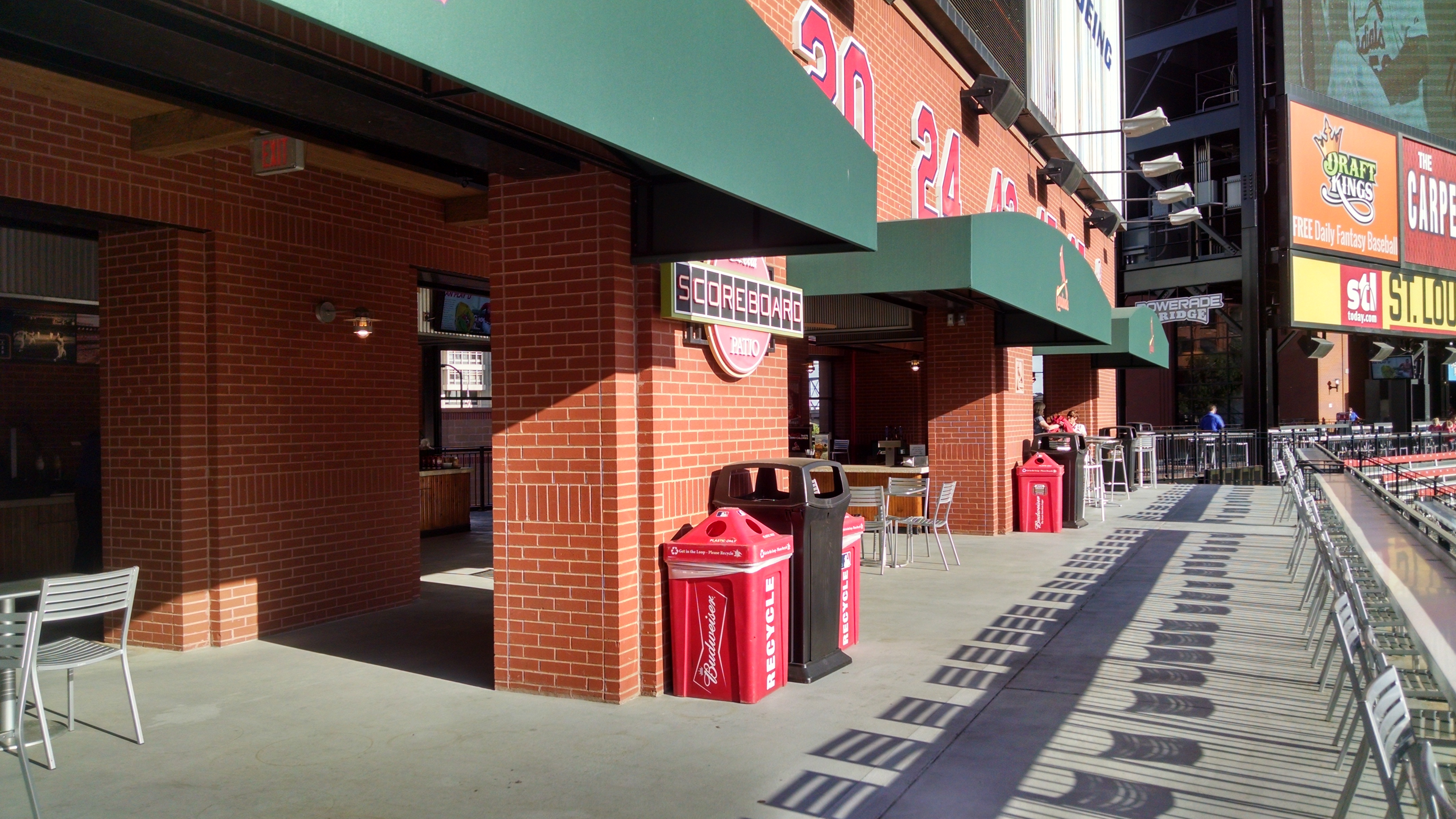 behind the scoreboard patio seats