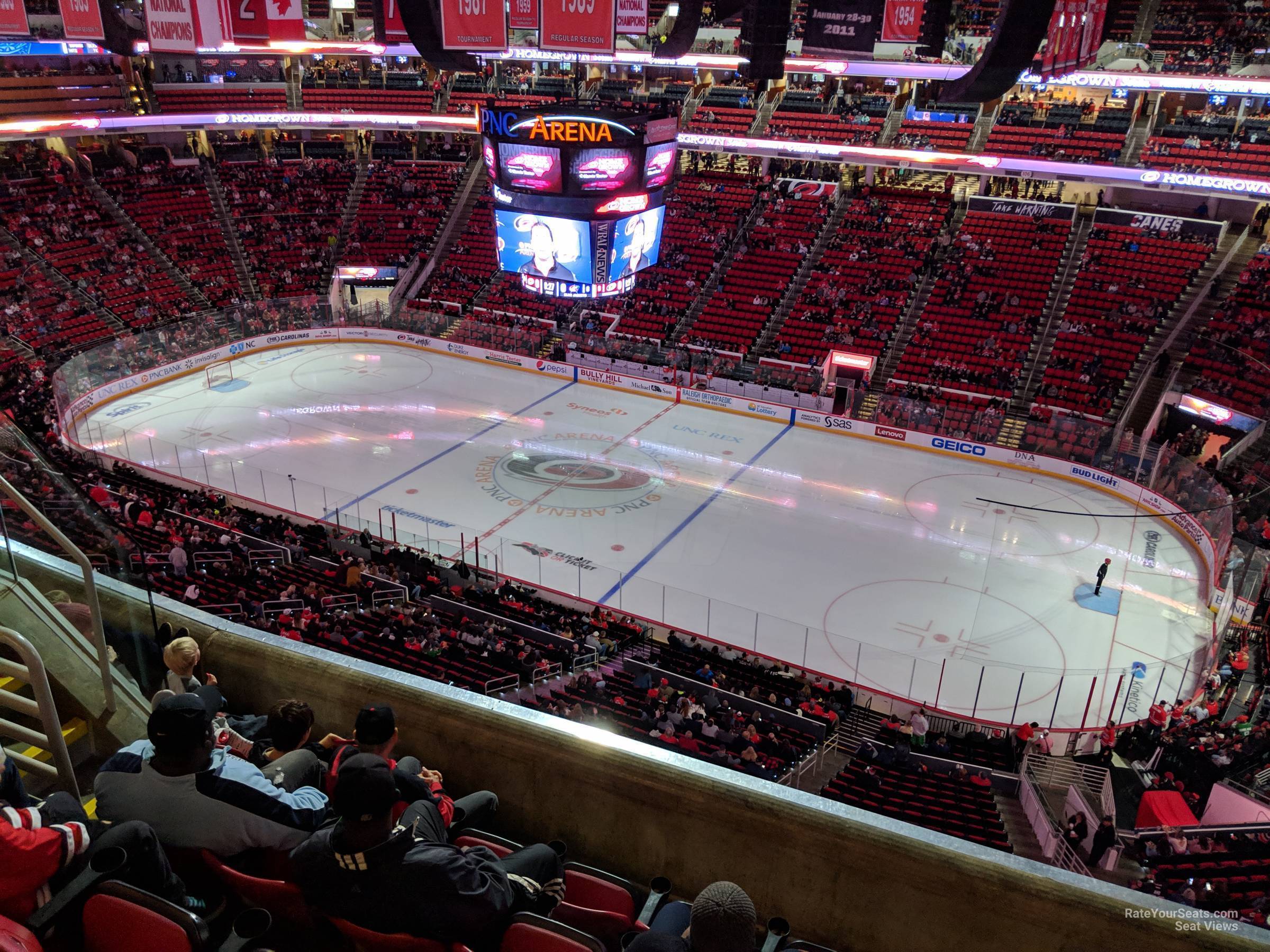 section 321, row e seat view  for hockey - pnc arena