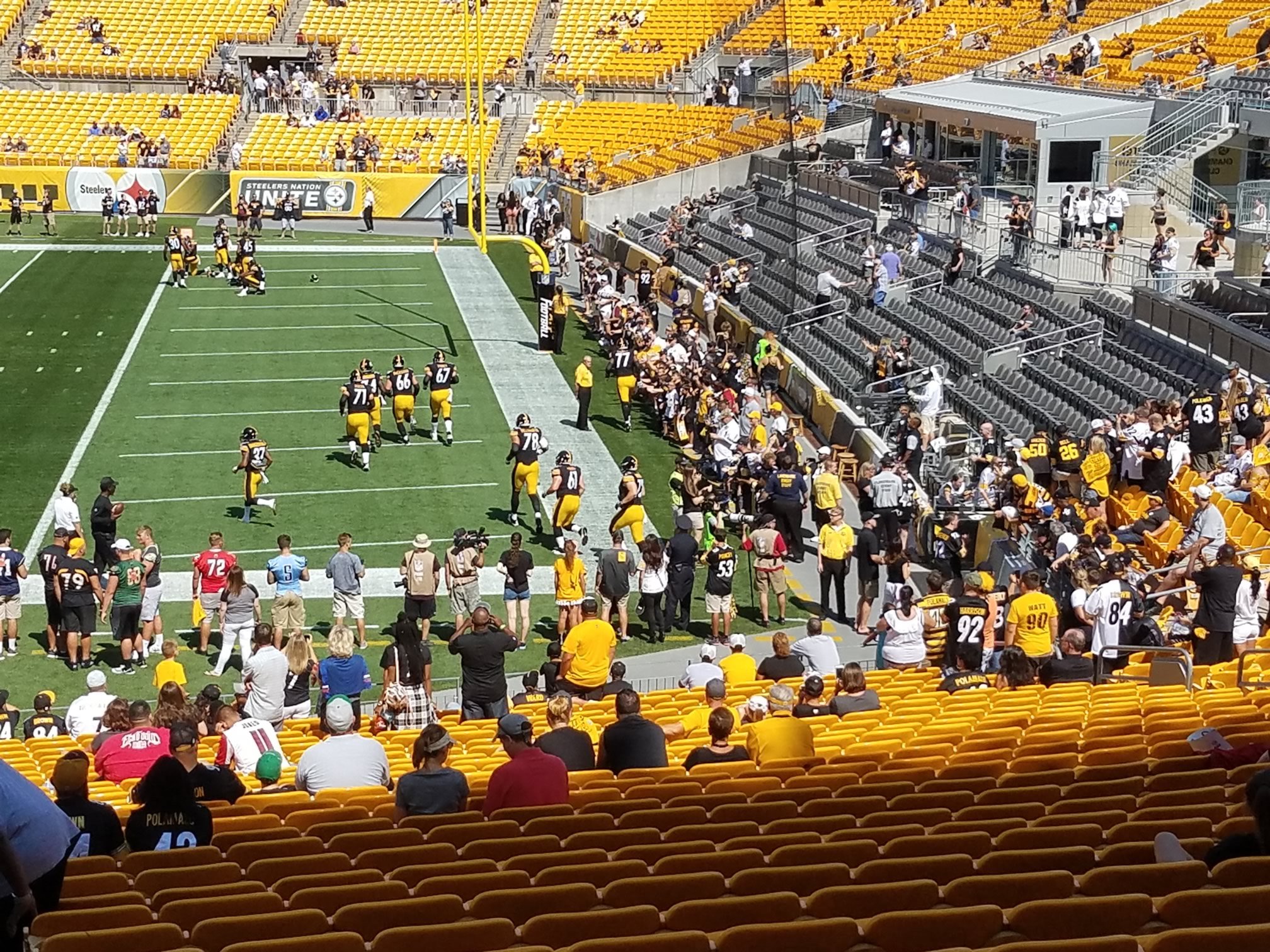 steelers players running onto field